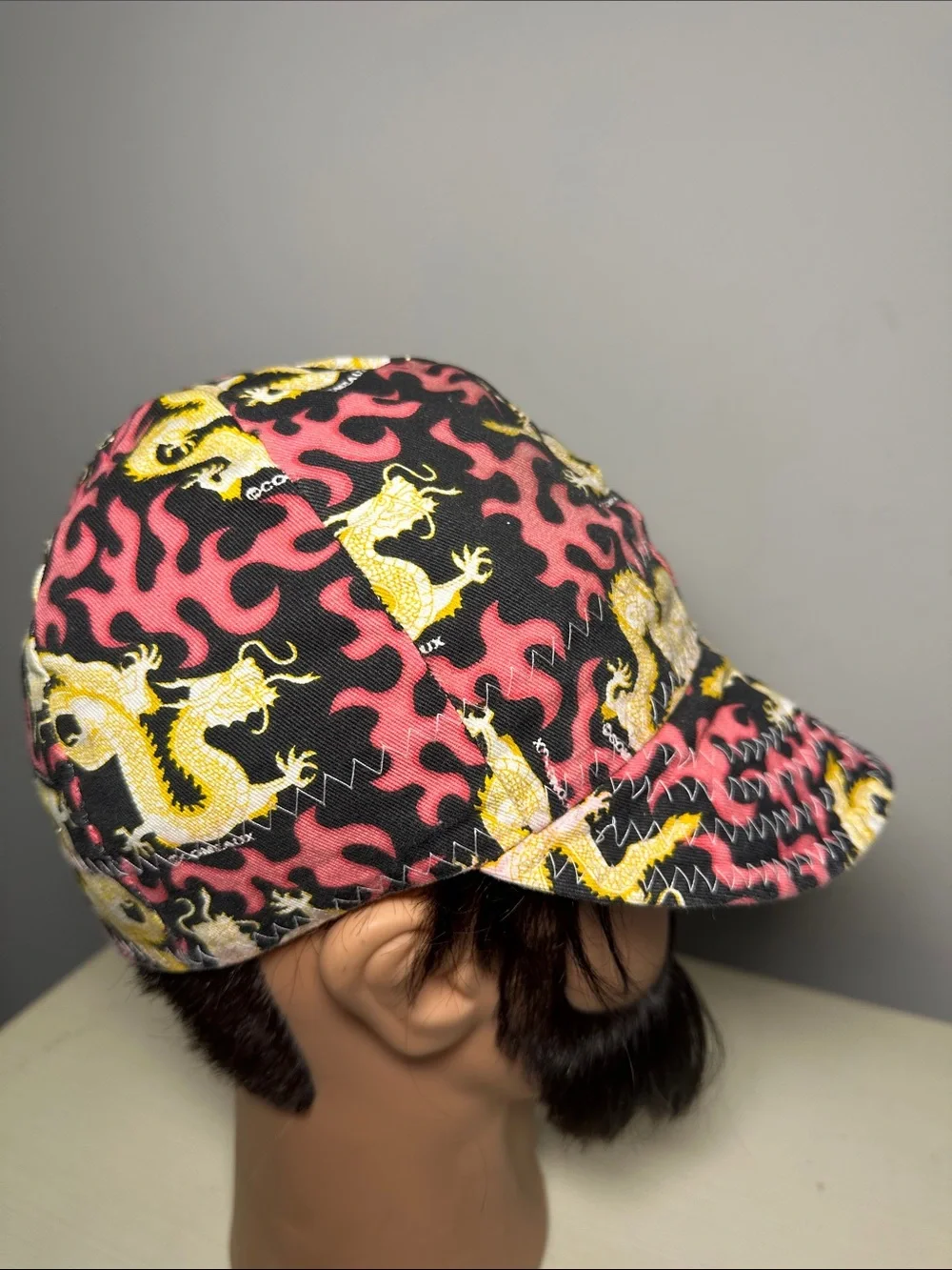 Comeaux reversible Pink & Black Dragon Print and red comfort soft Cap